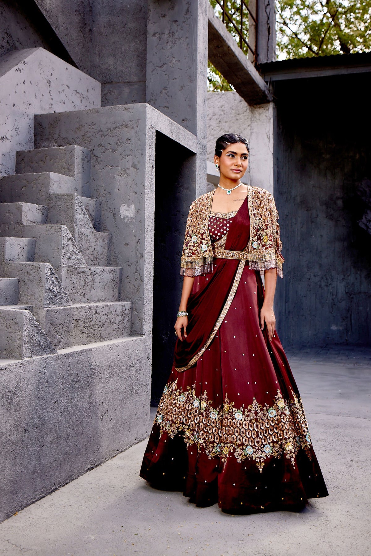 A pre-draped brown lahenga saree