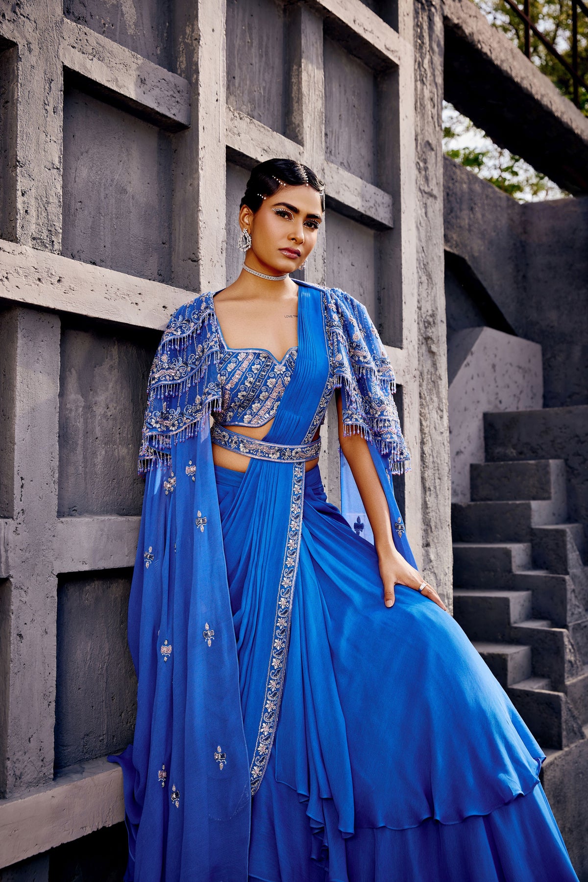 A pre-draped blue lahenga saree