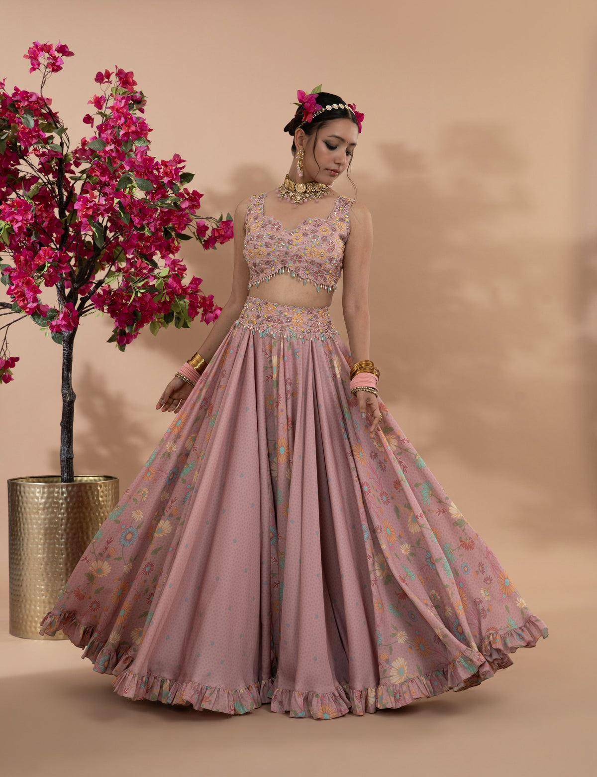 Dusty rose floral printed lehenga with cutwork blouse and dupatta set.