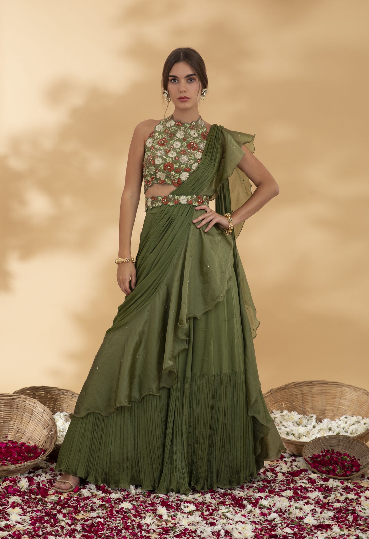 Juniper green pre draped saree with halter blouse and belt