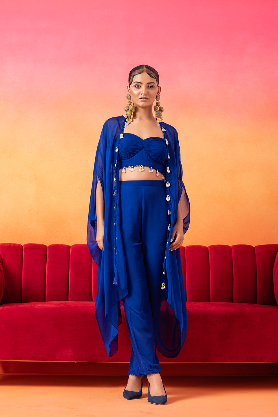 Electric Blue Cami Top Paired With Cape And Pants